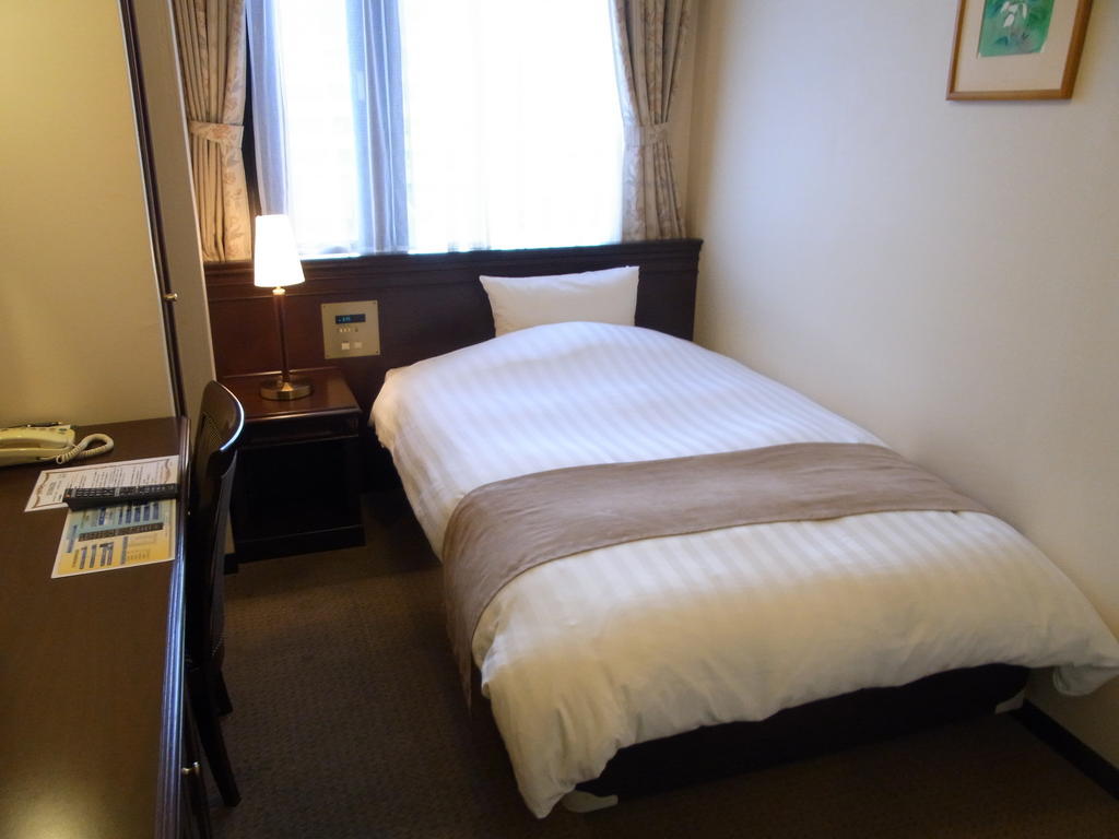 Amami Sunplaza Hotel Szoba fotó